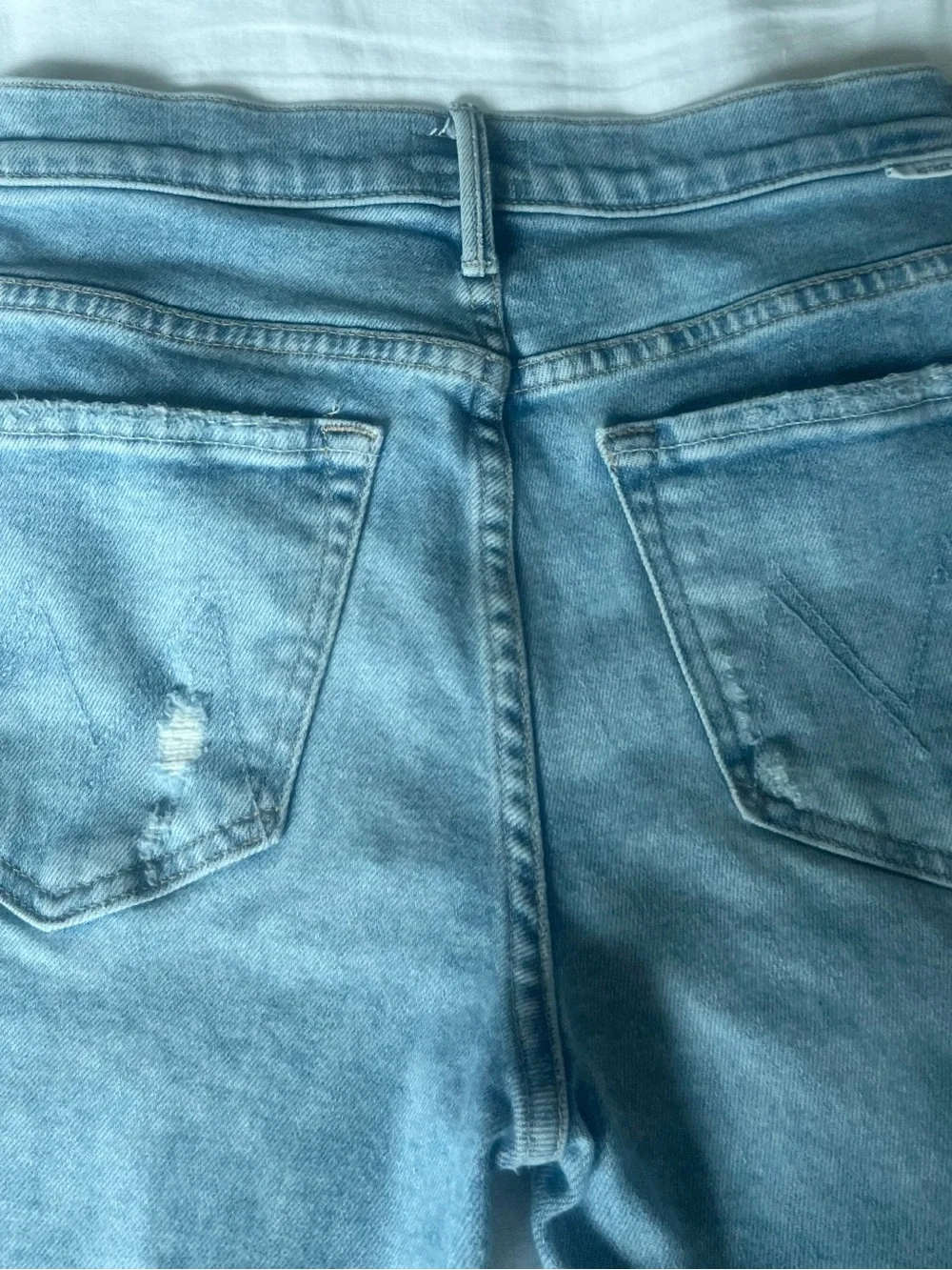 LOOK! Anthropologie MOTHER Light Wash Distressed Insider Flood Jeans